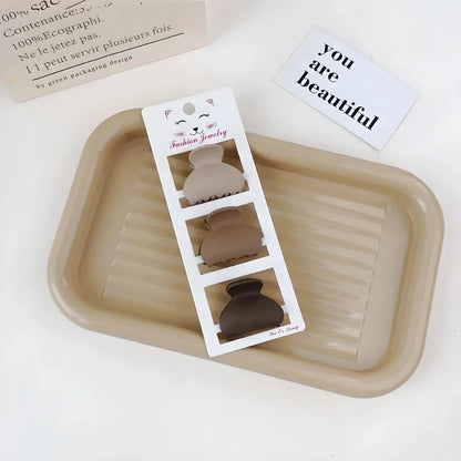 Coffee-coloured geometric hairpin set with frosted finish, various shapes for versatile styling
