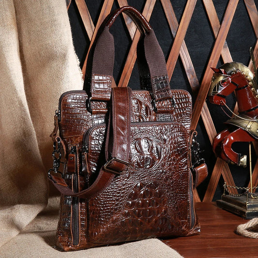 Premium brown leather commuting briefcase with vintage-inspired shoulder strap and textured leather button detailing
