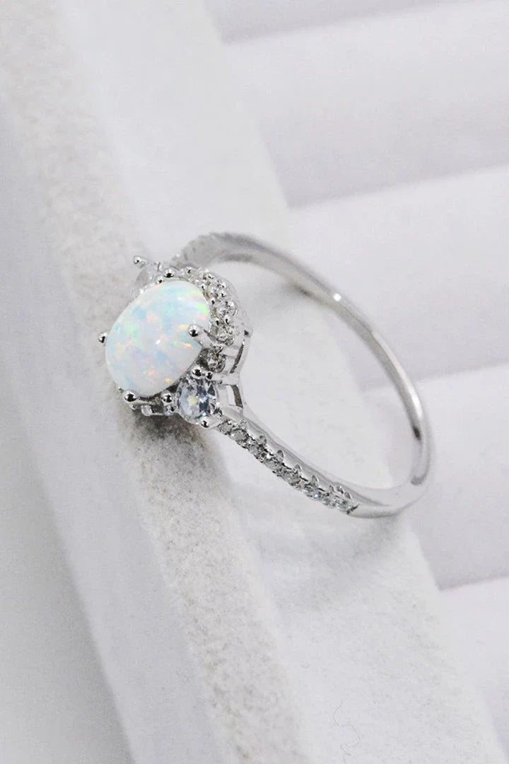A stunning platinum-plated opal ring made from 925 sterling silver, featuring a modern and minimalist design