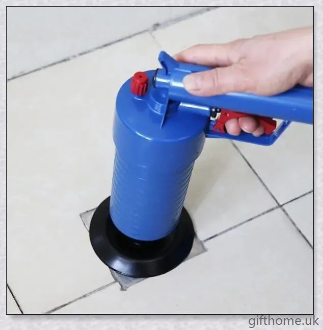 The Air Drain Blaster, a high-powered tool that uses compressed air to quickly unclog sinks, tubs, and toilets without harmful chemicals.