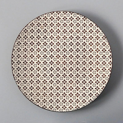 Elegant ceramic plates with vibrant, whimsical prints in a variety of enchanting designs