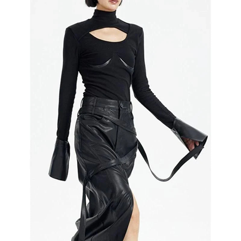 Chic knitted pullover with PU leather patchwork details, a versatile winter wardrobe essential.
