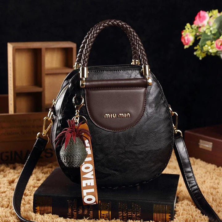 Fashionable women's one-shoulder diagonal bag in caramel, nude pink, black, wine red, and retro brown colours