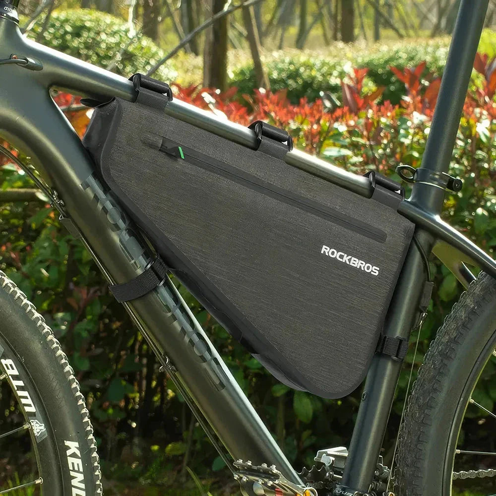 Waterproof and durable triangle-shaped bike bag with reflective accents, perfect for UK cyclists