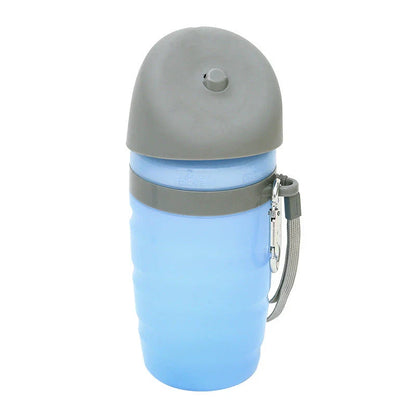 Portable dog water bottle with foldable drinking cup bowl, made of durable and food-grade plastic for safe hydration on walks, hikes, and outdoor activities.