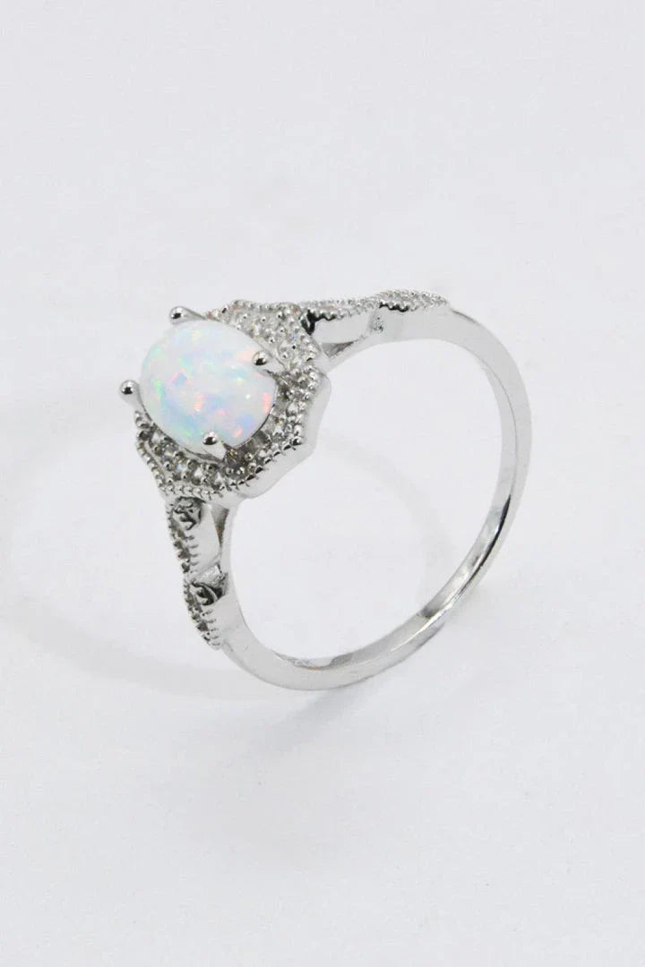 A stunning platinum-plated opal ring made from 925 sterling silver, featuring a modern and minimalist design