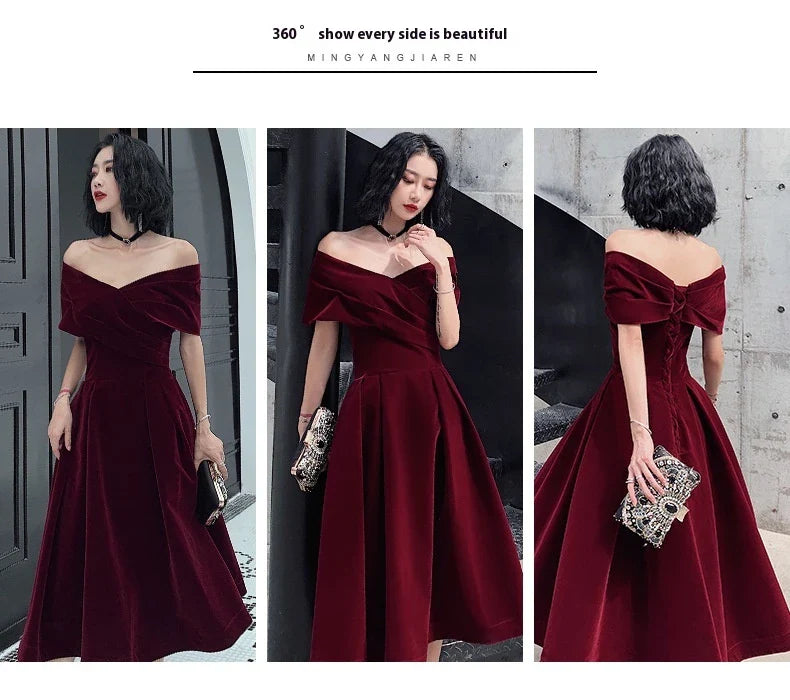 Off-shoulder wine red bridal dress with long, flowing skirt and tight waist for a sophisticated, elegant look
