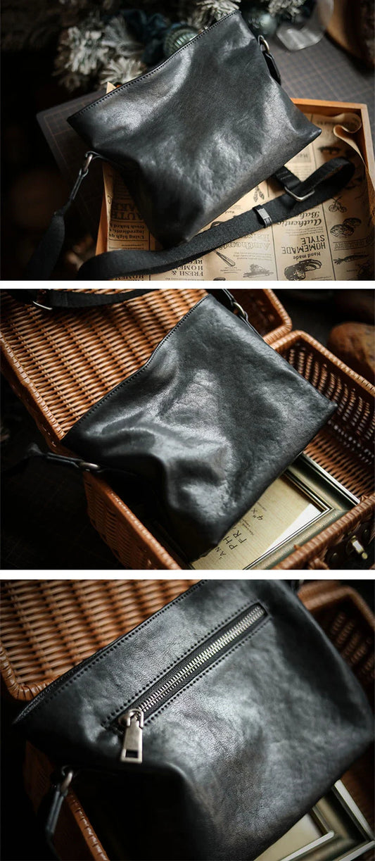 Premium black leather shoulder bag with horizontal zipper closure, featuring a spacious interior and versatile design for the modern British gentleman