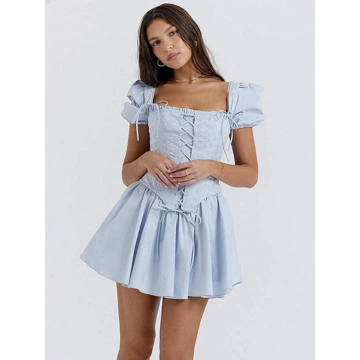 Elegant puff sleeve mini dress with square collar, backless design, and A-line silhouette for modern British women