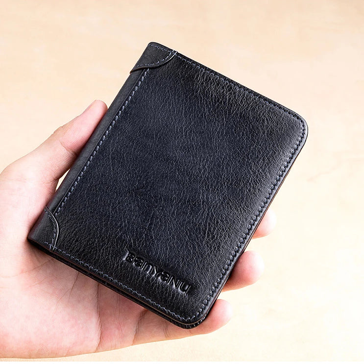 Premium men's short leather wallet with tri-fold design, made from top-grain cowhide leather for exceptional quality and style.