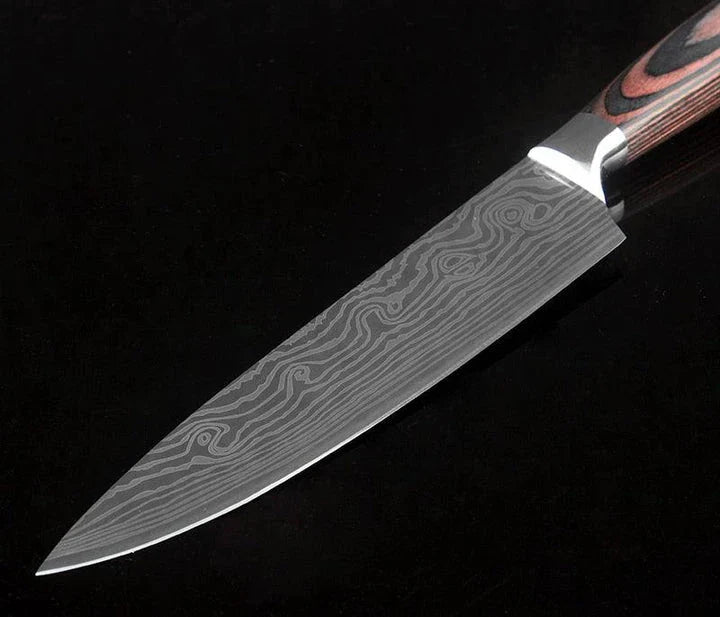 A set of three Japanese-style chef knives with stainless steel blades and ergonomic handles, perfect for slicing, dicing, and mincing in the kitchen.