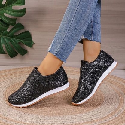 Premium sequinned flats with round toe and slip-on design, perfect for casual wear and special occasions.