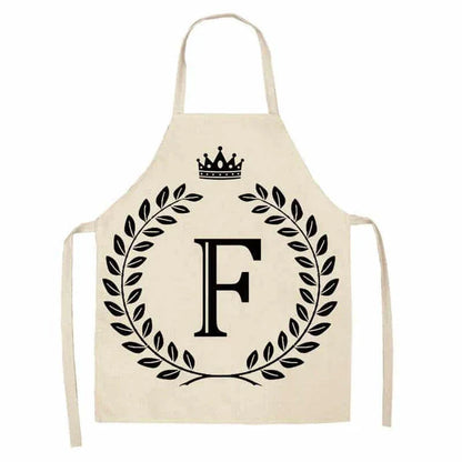 A high-quality kitchen apron featuring a charming crown and letter print design in a premium cotton and linen blend fabric.