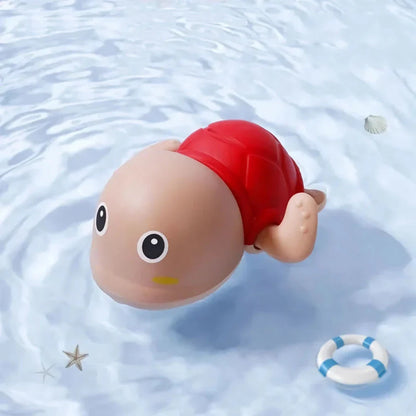Delightful wind-up bath toys in a red turtle design, floating and moving in the water, providing fun and engaging playtime for children.