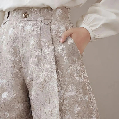 Elegant high-waisted floral jacquard A-line shorts with chic metal buttons, perfect for any occasion