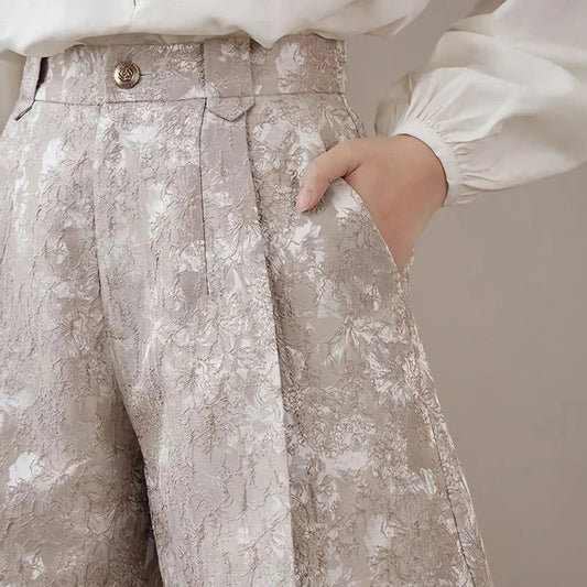 Elegant high-waisted floral jacquard A-line shorts with chic metal buttons, perfect for any occasion