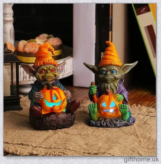 Eerie Halloween Resin Figurine with Glowing Pumpkin Lamp, a spooky and enchanting décor piece for your holiday celebrations