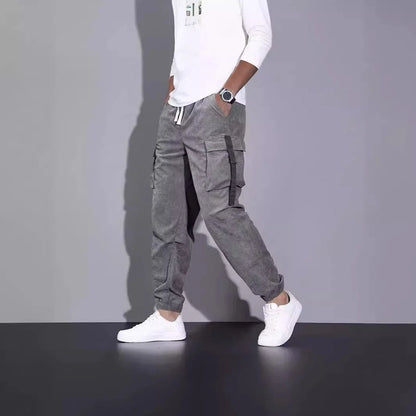 Premium British-inspired corduroy overalls with a relaxed, ankle-tied silhouette and stretchy, breathable fabric for all-day comfort and style.