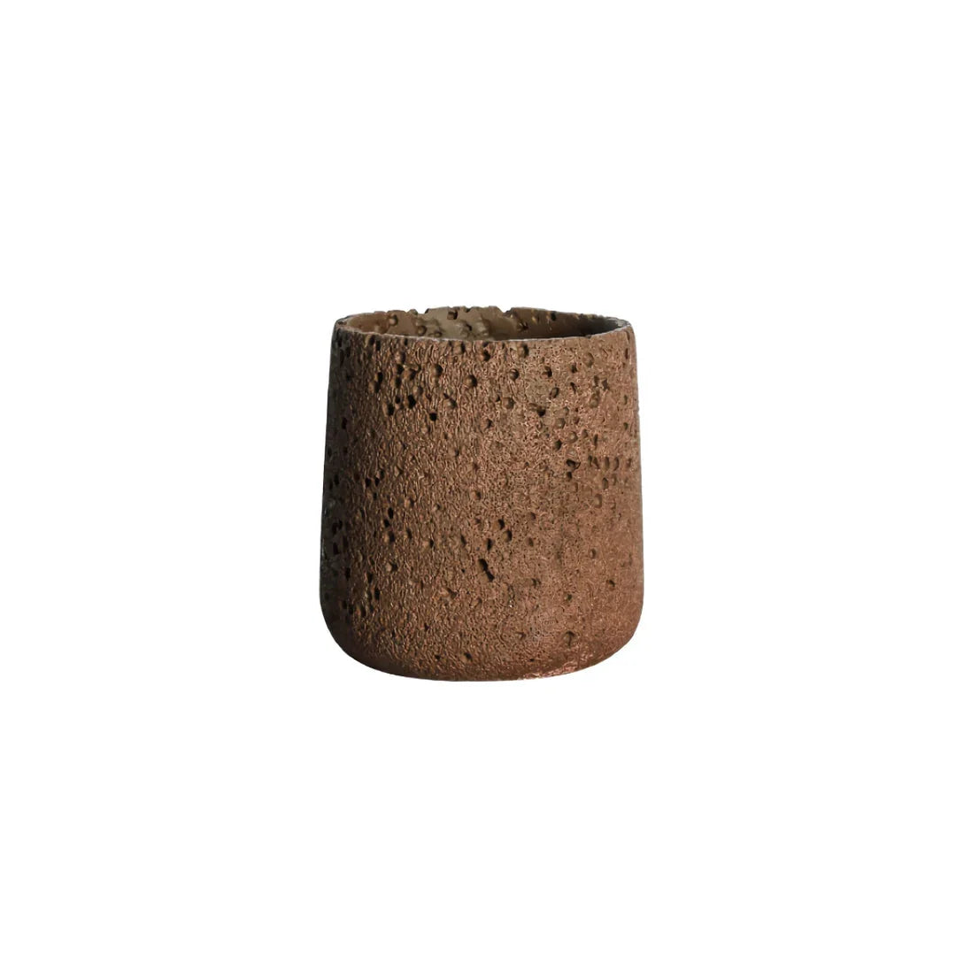 A modern, perforated cement bonsai planter in a Nordic-inspired design, available in various sizes and colours.