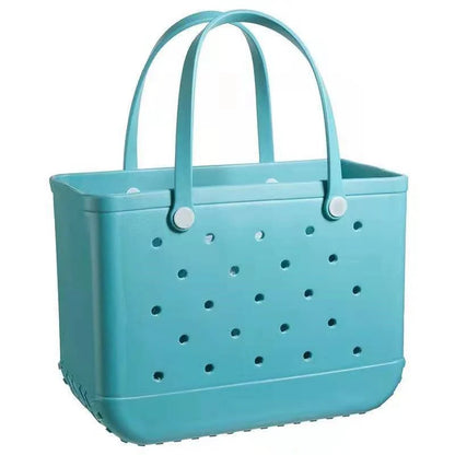 Premium waterproof beach tote bag in various vibrant colours, featuring spacious main compartment and multiple pockets for organised storage
