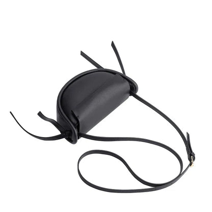 Premium cowhide leather crossbody bag in a distinctive semicircle shape, available in classic colours to complement any UK wardrobe