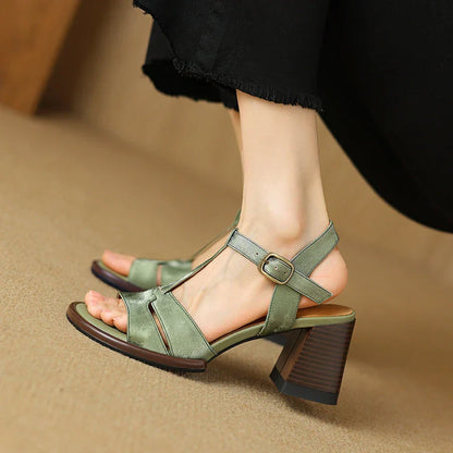 Genuine leather gladiator sandals with chunky heel, open-toe design, and secure buckle closure for summer style and comfort.