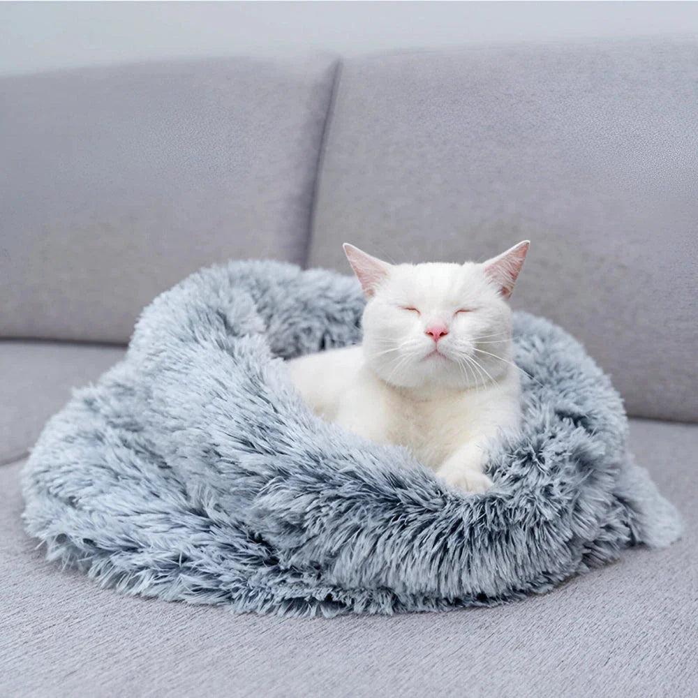 Cosy plush pet sleeping bag in grey colour, designed to keep small pets warm and comfortable