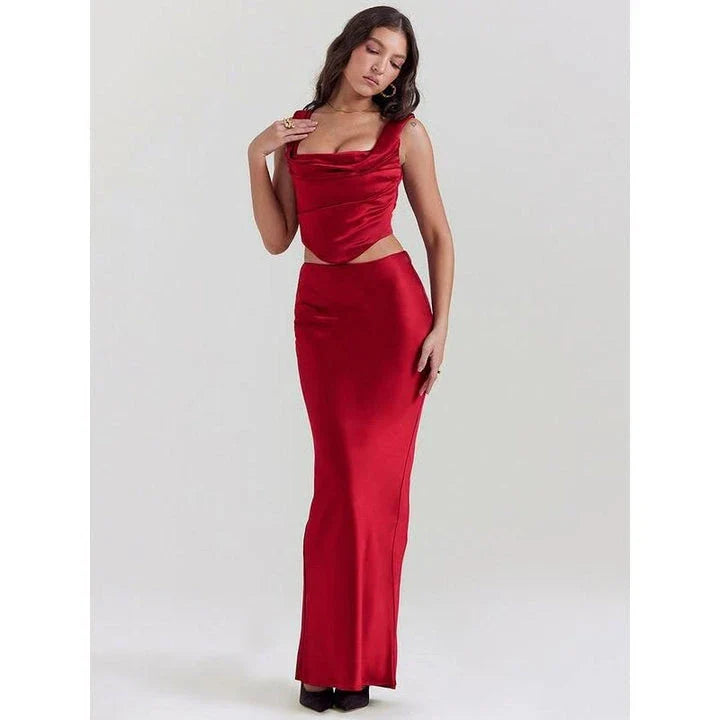 Elegant satin two-piece skirt set featuring a backless crop top and ankle-length skirt in a rich wine colour