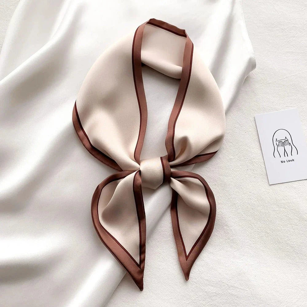 Luxury silk-feel narrow scarf in blue colour, a versatile fashion accessory for the modern British woman