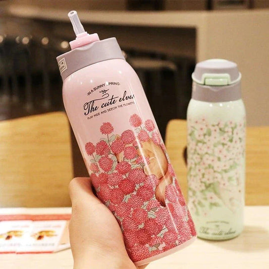 Stylish floral double-wall insulated water bottle with straw, made of high-quality stainless steel for long-lasting use and temperature control.