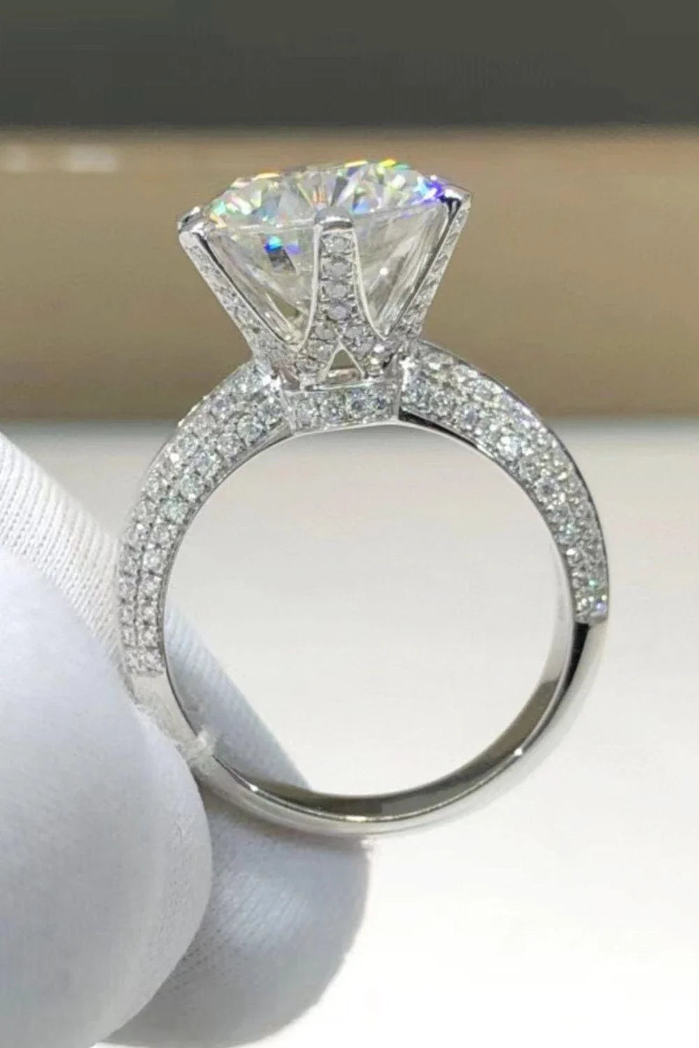 Elegant 5 carat moissanite solitaire ring in 925 sterling silver with platinum plating and sparkling zircon accents