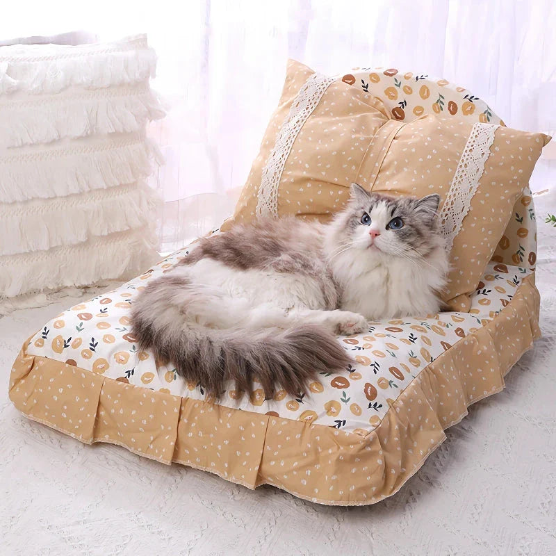 Cosy bow-accented pet bed with a detachable cushion, providing a luxurious and stylish sleeping retreat for small to medium-sized dogs and cats.