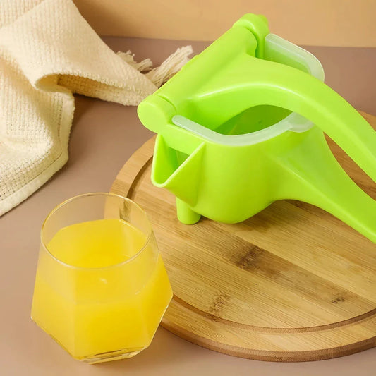 Premium manual fruit and citrus juicer with compact, portable design and multiple colour options