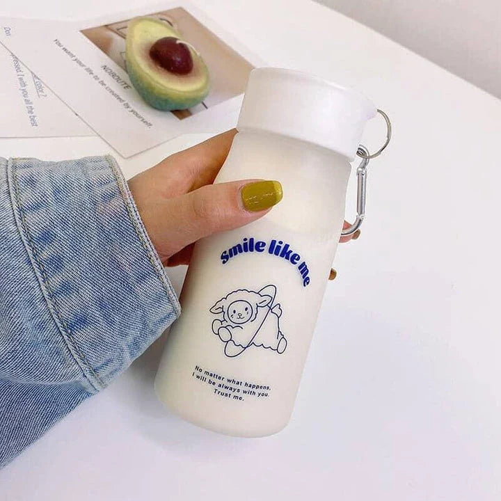 A frosted plastic water bottle with a cartoon dog design, perfect for everyday hydration and a fun, playful look.