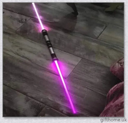 Premium dual-bladed lightsaber with sleek silver hilt, vibrant light modes, and sound effects for authentic Star Wars gameplay