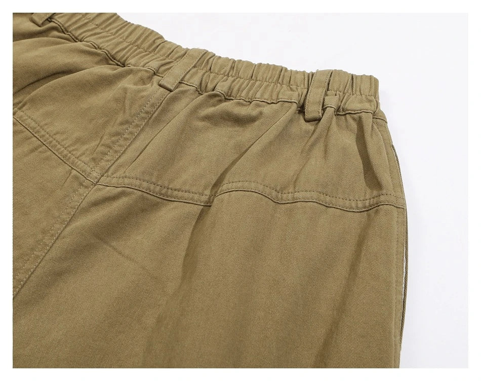 Sophisticated men's casual trousers in various colours, featuring a tailored straight-leg design and mid-rise waistline for a polished, British-inspired look.