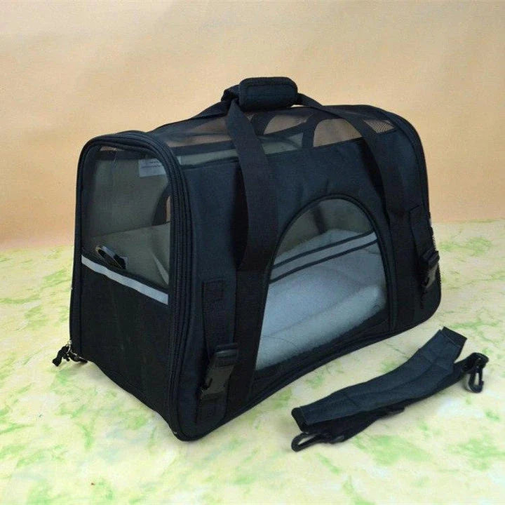 Portable pet carrier bag made of durable nylon with breathable mesh panels for your dog or cat's comfort during travel