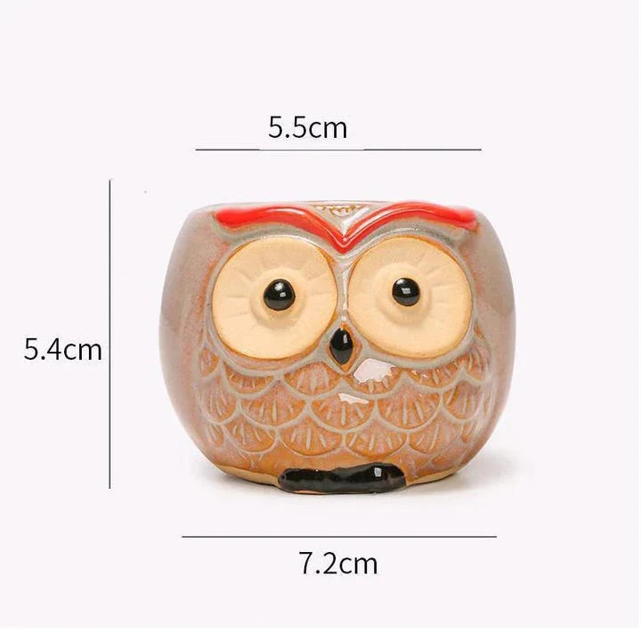 Adorable owl-shaped ceramic flower pot in white, suitable for succulents and small plants