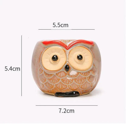 Adorable owl-shaped ceramic flower pot in white, suitable for succulents and small plants