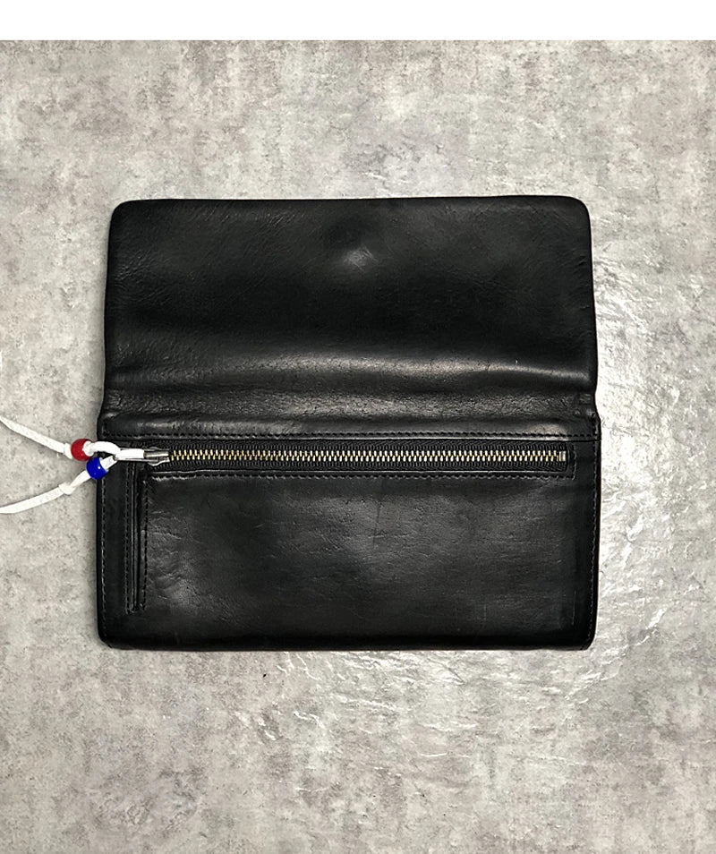 Premium handcrafted cowhide wallet with retro-inspired design, featuring hidden zipper compartment and dedicated card slots