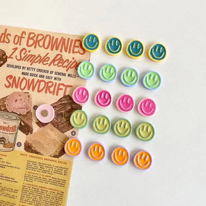 Cheerful Nordic-inspired refrigerator magnets with cartoon designs in various colours, made of high-quality resin for durability