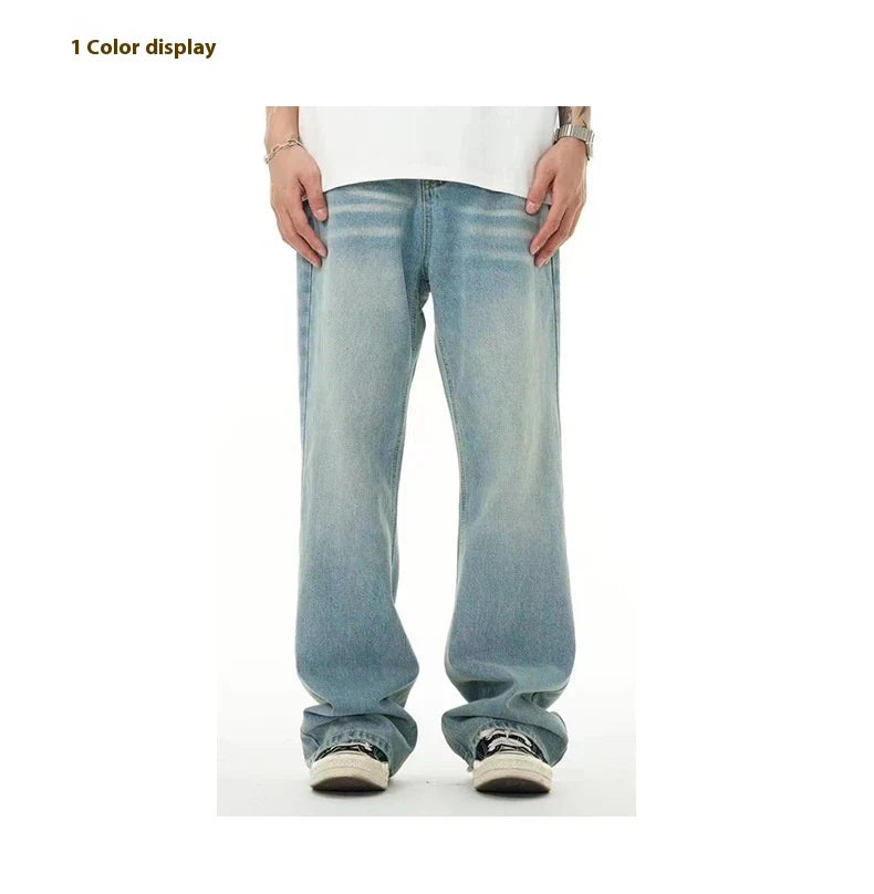 Premium light blue washed relaxed fit jeans with subtle fading and distressing, made from high-quality cotton for exceptional comfort and durability.