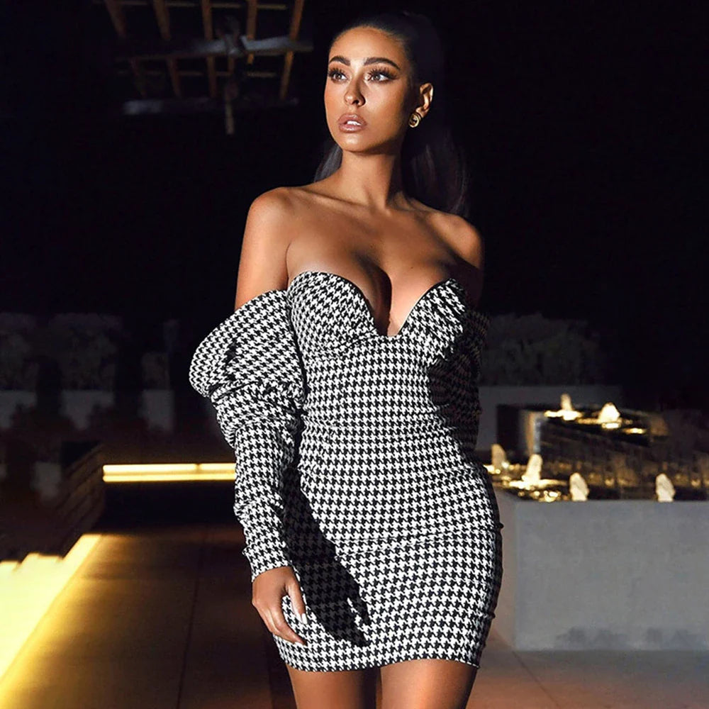Sophisticated houndstooth wrap dress with flattering high waist and premium polyester construction