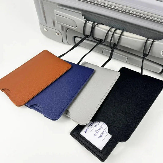Premium PU leather luggage tags in a vibrant gray colour, with a discreet pull-out information card for easy customization.