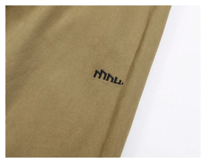 Sophisticated men's casual trousers in various colours, featuring a tailored straight-leg design and mid-rise waistline for a polished, British-inspired look.