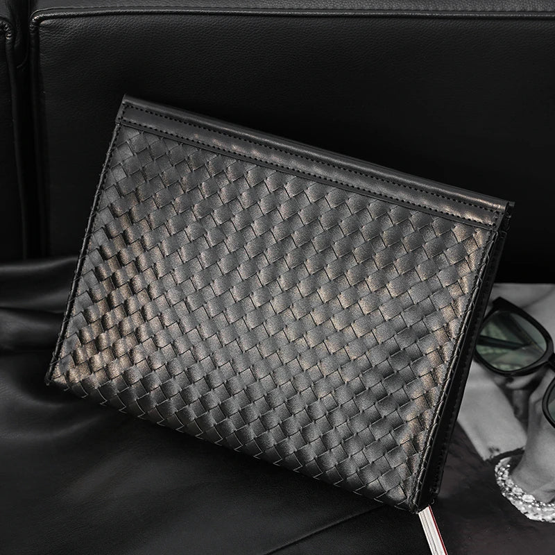 Premium hand-woven black leather briefcase with multiple pockets and adjustable shoulder strap