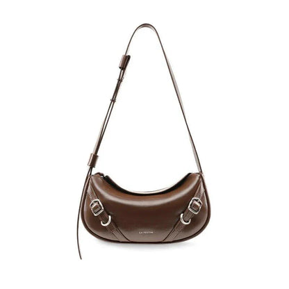 Elegant black shoulder and crossbody baguette bag made with premium split leather and synthetic lining