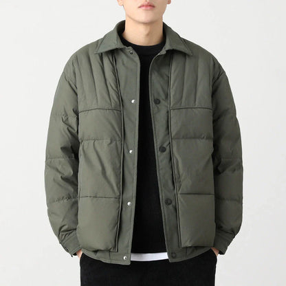 A premium lightweight down jacket in a sleek, tailored design for the stylish British gentleman