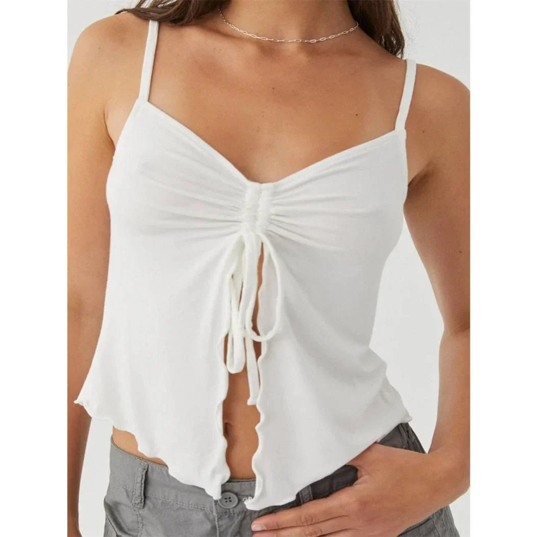 Chic white sleeveless crop top with side bandage detail, perfect for summer fashion