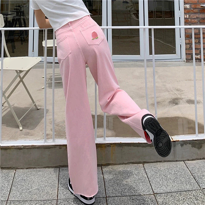 Premium cotton denim high-waist wide-leg trousers in a flattering, figure-hugging silhouette
